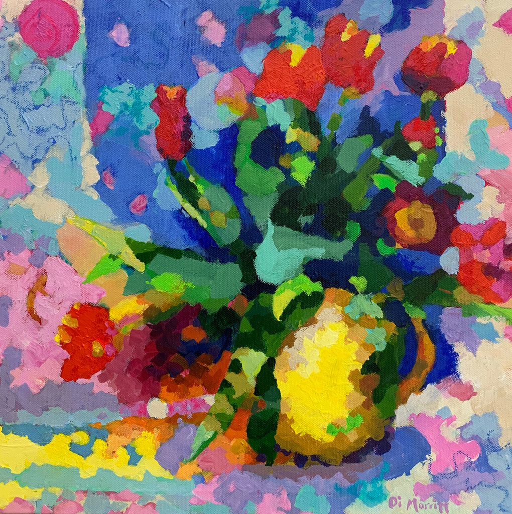 Tulips in a yellow vase